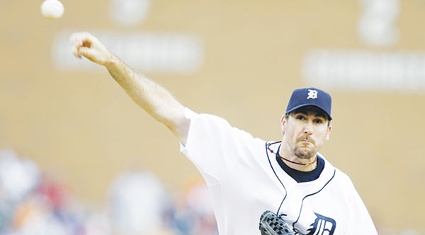 On the Fly <span class='credit'>Photo Courtesy of MCT Campus</span><span class='description'>On the Fly: Justin Verlander throws a pitch against the Mariners on August 19th.</span>